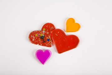 Four hearts with celebration confetti