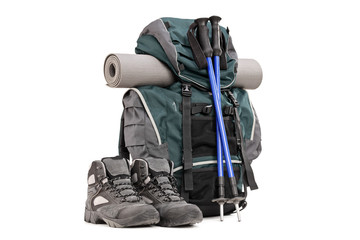 Hiking equipment, rucksack, boots, poles and slipping pad