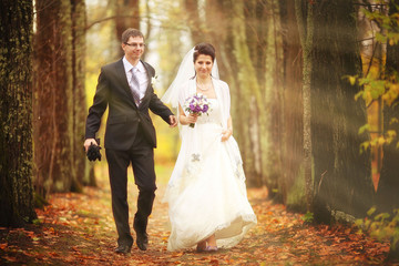 young family, the couple at the wedding walk