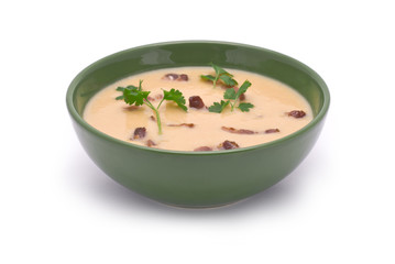 Pea Cream-Soup with Grilled Bacon isolated on white