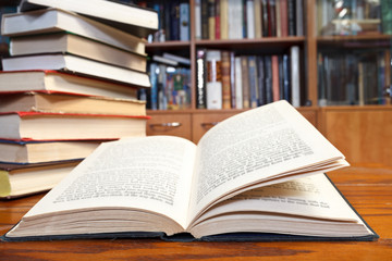 open book on wooden table