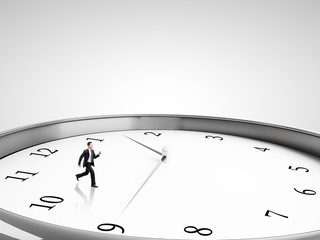 businessman runing in clock