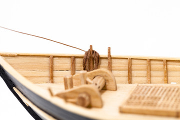ship model - the wooden model of the ship photographed by a close up. focus on ropes