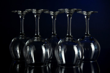 Glasses on dark blue background