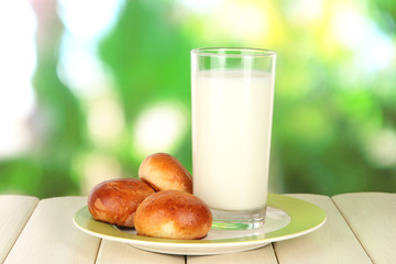 Bread roll and glass of milk