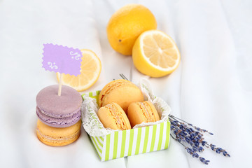 Macaroons on white cloth close-up