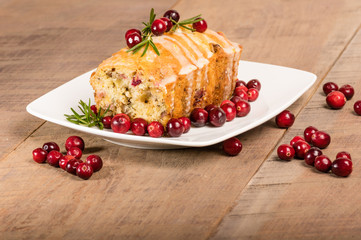 Cranberry walnut bread on a white plate