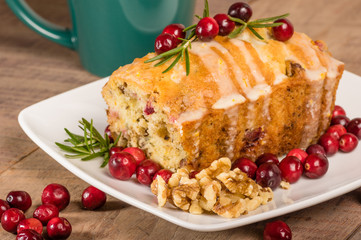 Cranberry walnut bread on a white plate