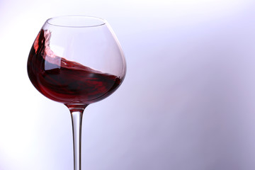 Wineglass with red wine, isolated on white