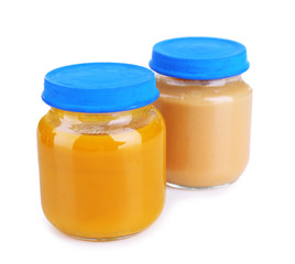 Baby food in glass jars, isolated on white
