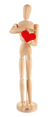 Wooden mannequin holding red heart isolated on white