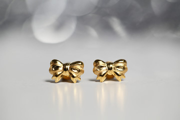 Golden ribbon earring gift