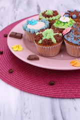 Tasty cupcakes with butter cream,