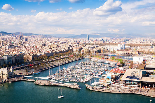 Aerial view of Barcelona city with Port Vell