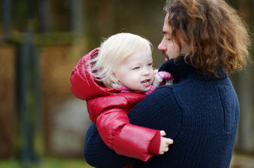 Young father and his daughter portrait