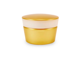 Golden face cream bottle. Isolated.
