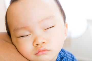 Asian baby boy sleeping