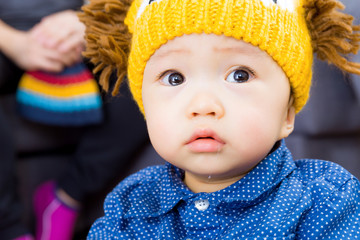 Asian baby boy feeling sad