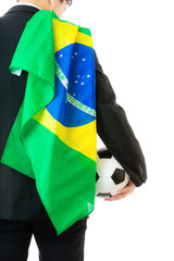 Businessman with soccer ball and brazil flag