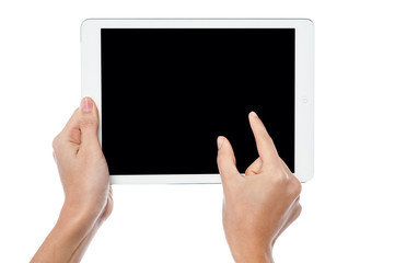Fingers being pointed on tablet screen