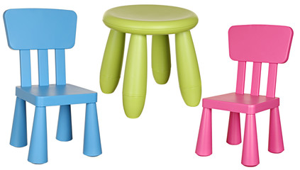Three children's plastic chairs isolated on a white background: