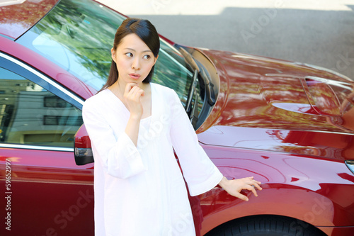 車の前で悩む女性 Canvas Print Canvas Prints Wallsheaven Naka