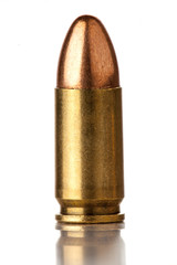 9mm bullet for a gun isolated on a white background - obrazy, fototapety, plakaty