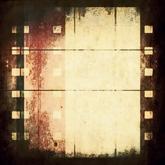 Naklejka premium old blank film strip frame background