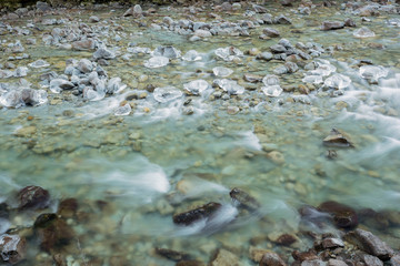 River with icicles in winter