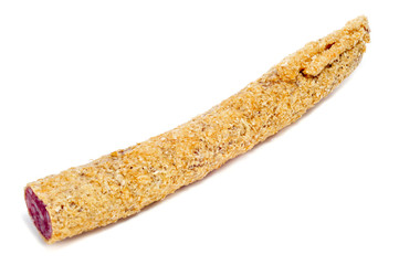 fuet, a spanish sausage, coated with onion
