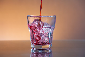 cranberry juice with ice cubes 