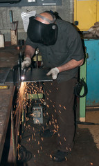 Hard at work in a metal fabrication shop