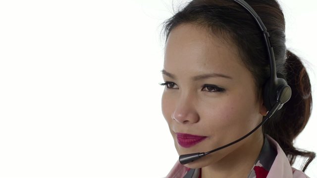 Asian girl working as call center operator