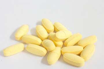 Fototapeta na wymiar Yellow pills