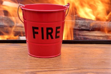 Fire bucket and Flames © Alex