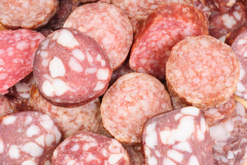 sliced sausage as food background