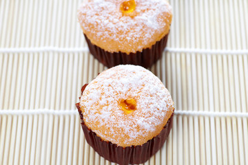 Fruit cakes on mat a