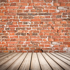 Abstract interior with wooden floor and red brick wall