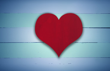 Red heart sign on blue and green retro wooden panel background