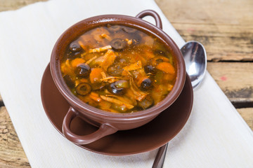 Traditional Russian meat soup with salty cucumbers