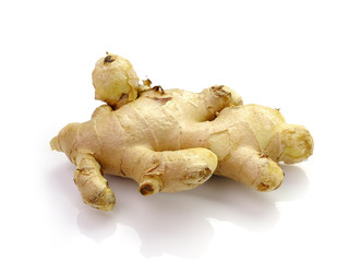 Root ginger isolated on a white studio background.