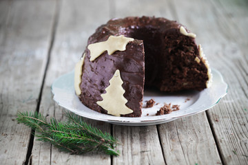 Chocolate gugelhupf cake with marzipan, christmas tree
