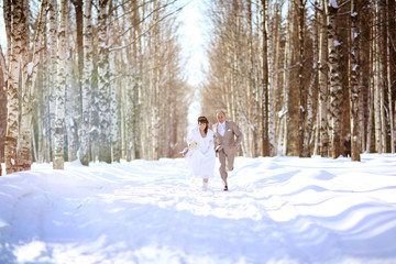 bride and groom in forest