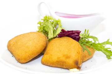 grilled cheese with sauce on a white background