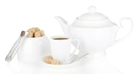 Cup of coffee, sugar-bowl and teapot isolated on white