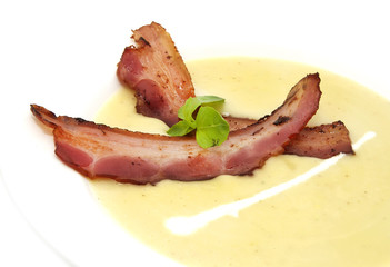 meal pea soup and bacon in a restaurant