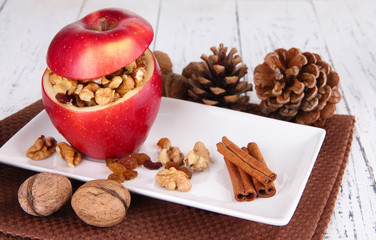 Stuffed apple with nuts and cinnamon