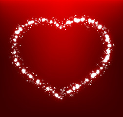 Glowing heart on dark red background