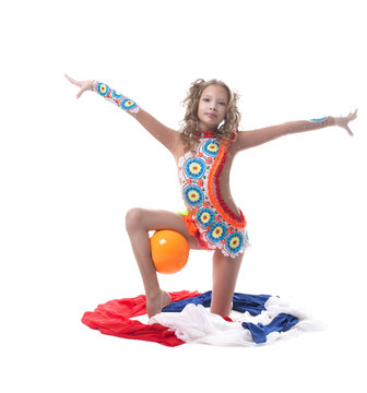 Image of young artistic gymnast posing in studio