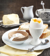 Boiled egg with pink salt for breakfast